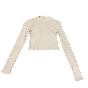 American Eagle white cropped long sleeve with cute floral imprint on fabric